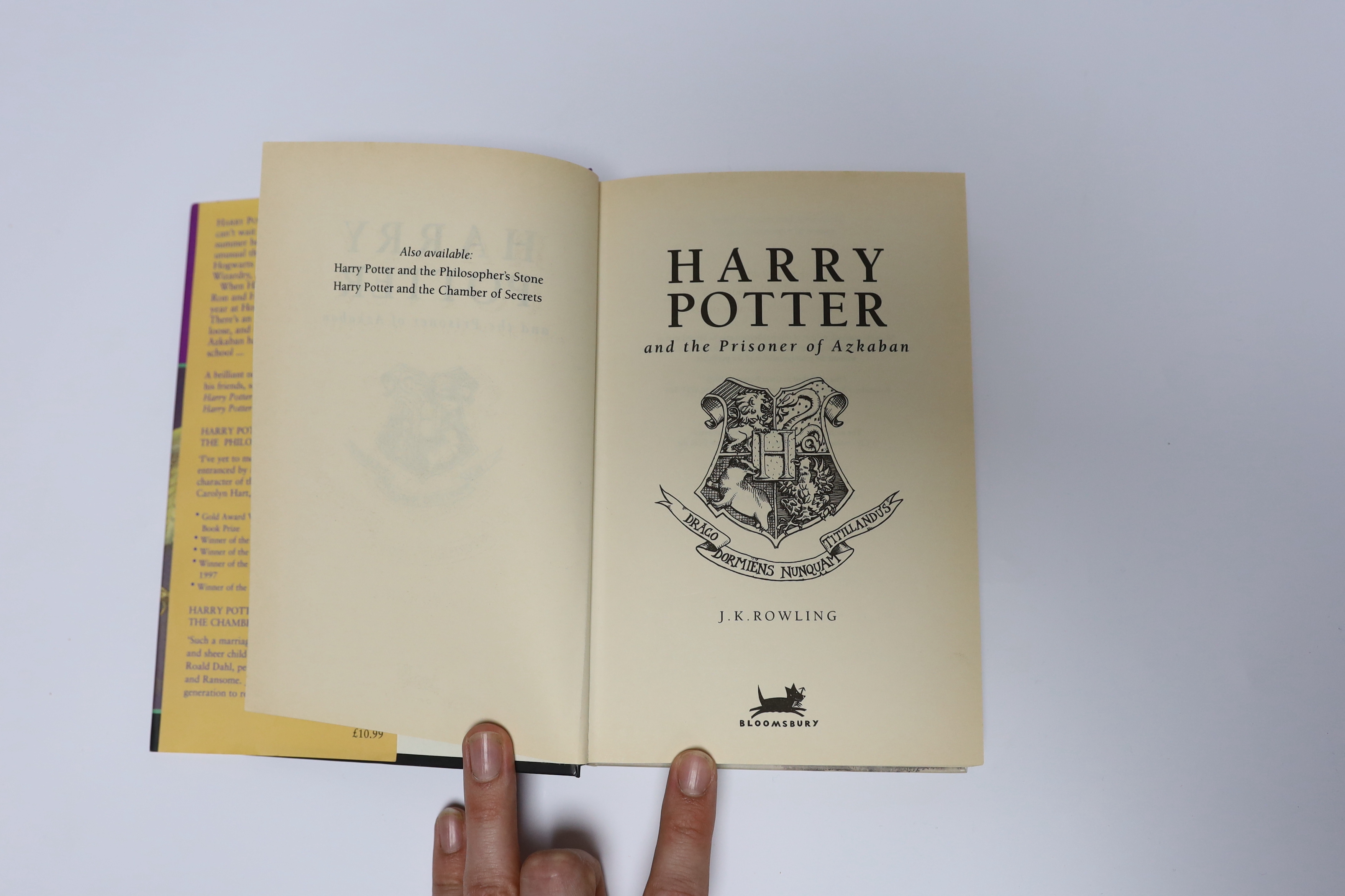 Rowling, J.K - Harry Potter and the Prisoner of Azkaban. First Edition (early reprint). armorial on half and title page; publisher's coloured pictorial boards and d/wrapper, 1999
